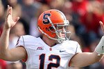 CINCINNATI - OCTOBER 30:  Ryan Nassib #12 of the Syracuse Orange celebrates a touchdown the Big East Conference game against the Cincinnati Bearcats at Nippert Stadium on October 30, 2010 in Cincinnati, Ohio.  (Photo by Andy Lyons/Getty Images)