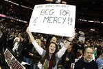 CLEVELAND, OH - DECEMBER 02:  Fans hold up signs prior to the Cleveland Cavaliers playing the Miami Heat at Quicken Loans Arena on December 2, 2010 in Cleveland, Ohio. NOTE TO USER: User expressly acknowledges and agrees that, by downloading and or using this photograph, User is consenting to the terms and conditions of the Getty Images License Agreement.  (Photo by Gregory Shamus/Getty Images)
