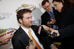 LAS VEGAS, NV - DECEMBER 02:  Dale Earnhardt Jr. (C), driver of the #88 National Guard/AMP Energy Chevrolet, speaks to the media after the NASCAR Sprint Cup Series Champions Week NMPA Myers Brothers Awards Luncheon at the Bellagio on December 2, 2010 in Las Vegas, Nevada.  (Photo by Todd Warshaw/Getty Images for NASCAR)