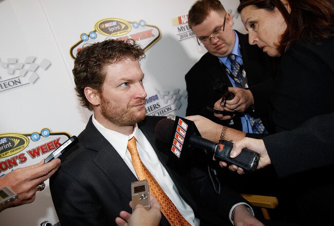 LAS VEGAS, NV - DECEMBER 02:  Dale Earnhardt Jr. (C), driver of the #88 National Guard/AMP Energy Chevrolet, speaks to the media after the NASCAR Sprint Cup Series Champions Week NMPA Myers Brothers Awards Luncheon at the Bellagio on December 2, 2010 in Las Vegas, Nevada.  (Photo by Todd Warshaw/Getty Images for NASCAR)