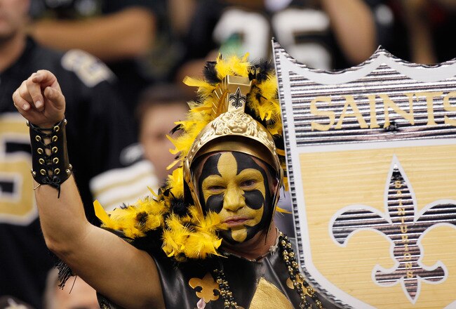 NEW ORLEANS - NOVEMBER 21:  A fan of the New Orleans Saints cheers against the Seattle Seahawks at Louisiana Superdome on November 21, 2010 in New Orleans, Louisiana.  (Photo by Kevin C. Cox/Getty Images)