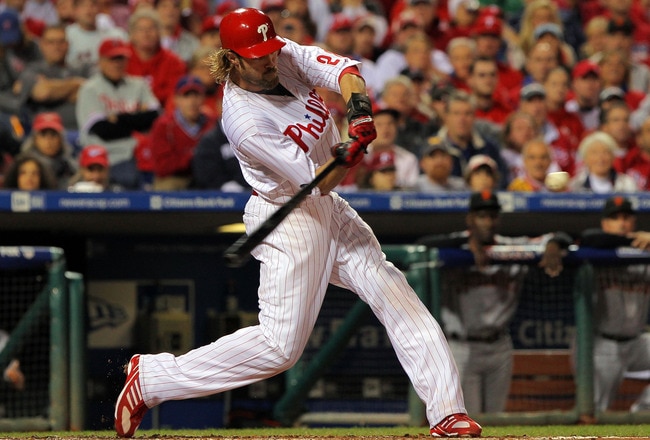 PHILADELPHIA - OCTOBER 23:  Jayson Werth #28 of the Philadelphia Phillies connects for a first inning sacrifice fly against the San Francisco Giants in Game Six of the NLCS during the 2010 MLB Playoffs at Citizens Bank Park on October 23, 2010 in Philadelphia, Pennsylvania.  (Photo by Doug Pensinger/Getty Images)