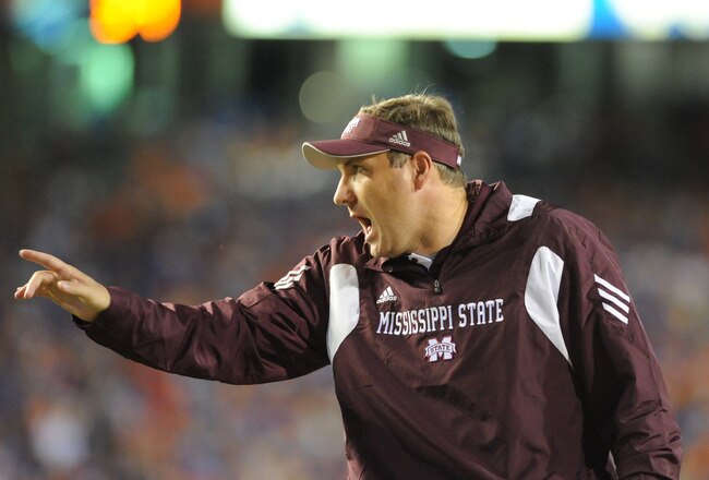 GAINESVILLE, FL - OCTOBER 16:  Coach Dan Mullen of the Mississippi State Bulldogs directs play against the Florida Gators  October 16, 2010 Ben Hill Griffin Stadium at Gainesville, Florida.  (Photo by Al Messerschmidt/Getty Images)