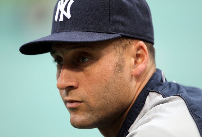 ARLINGTON, TX - OCTOBER 22:  Derek Jeter #2 of the New York Yankees looks on during batting practice against the Texas Rangers in Game Six of the ALCS during the 2010 MLB Playoffs at Rangers Ballpark in Arlington on October 22, 2010 in Arlington, Texas.  (Photo by Stephen Dunn/Getty Images)
