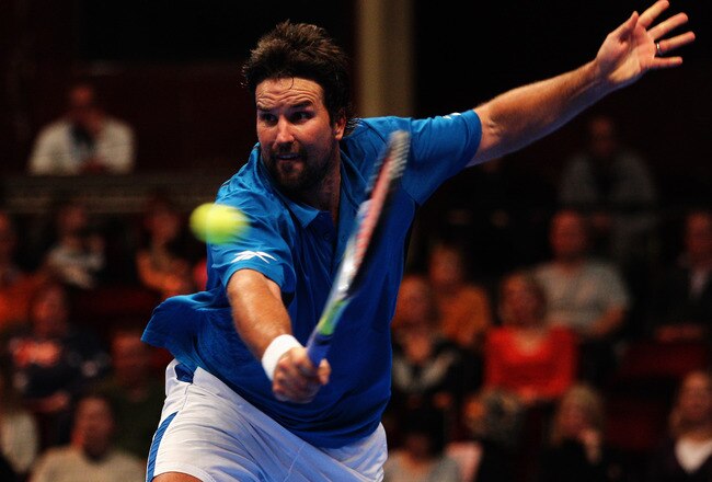 LONDON, ENGLAND - DECEMBER 04:  Pat Rafter of Australia in action during the semi final match between Goran Ivanisevic and Pat Rafter on day five of the AEGON Masters 2010 at the Royal Albert Hall on December 4, 2010 in London, England.  (Photo by Paul Gilham/Getty Images)