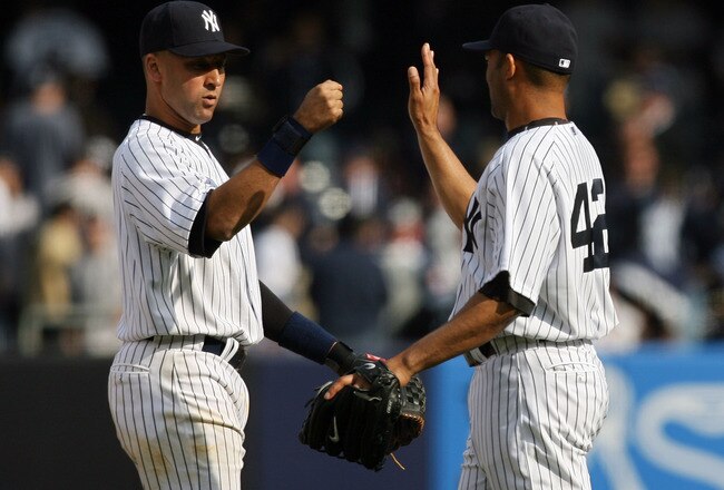 NEW YORK - APRIL 13:  Derek Jeter #2 and Mariano Rivera #42 of the New York Yankees celebrate after defeating the Los Angeles Angels of Anaheim during the Yankees home opener at Yankee Stadium on April 13, 2010 in the Bronx borough of New York City.  (Photo by Chris Trotman/Getty Images)