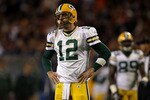 CHICAGO - SEPTEMBER 27:  Aaron Rodgers #12 of  the Green Bay Packers looks on dejected against the Chicago Bears at Soldier Field on September 27, 2010 in Chicago, Illinois.  (Photo by Jonathan Daniel/Getty Images)