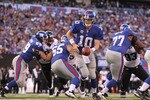 EAST RUTHERFORD, NJ - NOVEMBER 28:  Eli Manning #10 of the New York Giants in action against the Jacksonville Jaguars during their game on November 28, 2010 at The New Meadowlands Stadium in East Rutherford, New Jersey.  (Photo by Al Bello/Getty Images)