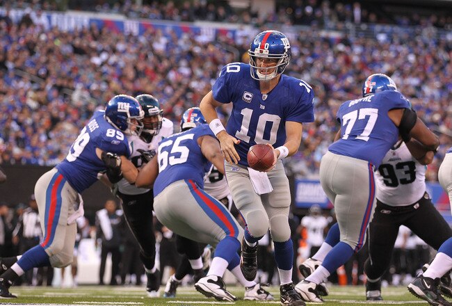 EAST RUTHERFORD, NJ - NOVEMBER 28:  Eli Manning #10 of the New York Giants in action against the Jacksonville Jaguars during their game on November 28, 2010 at The New Meadowlands Stadium in East Rutherford, New Jersey.  (Photo by Al Bello/Getty Images)
