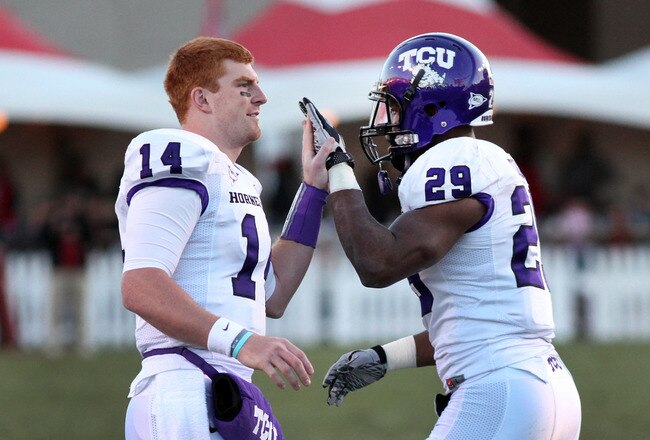 ALBUQUERQUE, NM - NOVEMBER 27: Quarterback Andy Dalton #14 of the TCU Horned Frogs celebrates with running back Matthew Tucker #29 against the University of New Mexico Lobos on November 27, 2010 at University Stadium in Albuquerque, New Mexico. TCU won 66-17. (Photo by Eric Draper/Getty Images)