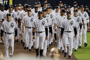 NEW YORK - SEPTEMBER 20:  Members of the New York Yankees attend the unveiling of late team owner George Steinbrenner's monument prior to playing against the Tampa Bay Rays on September 20, 2010 at Yankee Stadium in the Bronx borough of New York City.  (Photo by Jim McIsaac/Getty Images)