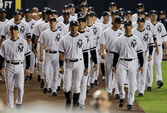 NEW YORK - SEPTEMBER 20:  Members of the New York Yankees attend the unveiling of late team owner George Steinbrenner's monument prior to playing against the Tampa Bay Rays on September 20, 2010 at Yankee Stadium in the Bronx borough of New York City.  (Photo by Jim McIsaac/Getty Images)