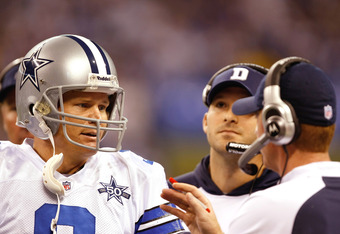 INDIANAPOLIS, IN - DECEMBER 05: Jon Kitna #3 of the Dallas Cowboys talks with Jason Garrett during a game against the Indianapolis Colts at Lucas Oil Stadium on December 5, 2010 in Indianapolis, Indiana.  (Photo by Scott Boehm/Getty Images)