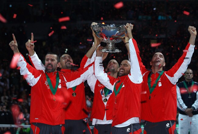 BELGRADE, SERBIA - DECEMBER 05:  Bogdan Obradovic, Nenad Zimonjic, Novak Djokovic, Janko Tipsarevic and Viktor Troicki of Serbia celebrate with the trophy after defeating France during day three of the Davis Cup Tennis Final at the Begrade Arena on December 5, 2010 in Belgrade, Serbia.  (Photo by Julian Finney/Getty Images)