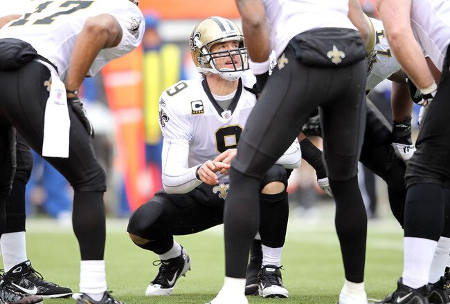 CINCINNATI, OH - DECEMBER 05:  Dree Brees #9 of the New Orleans Saints gives instructions to his team during the NFL game against the Cincinnati Bengals at Paul Brown Stadium on December 5, 2010 in Cincinnati, Ohio.  The Saints won 34-30.  (Photo by Andy Lyons/Getty Images)