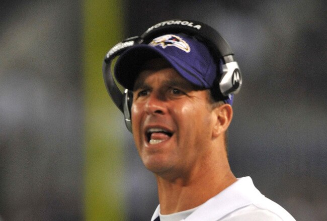 BALTIMORE - AUGUST 28:  Head coach John Harbaugh of the Baltimore Ravens speaks to the referees against the New York Giants in a preseason game at M&T Bank Stadium on August 28, 2010 in Baltimore, Maryland. The Ravens defeated the Giants 24-10. (Photo by Larry French/Getty Images)