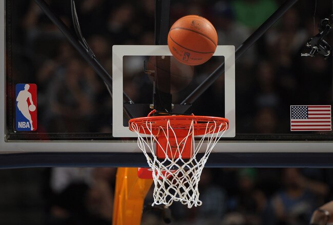 DENVER - NOVEMBER 16:  A detail photo of the ball as it falls through the rim as the Denver Nuggets face the New York Knicks at the Pepsi Center on November 16, 2010 in Denver, Colorado. The Nuggets defeated the Knicks 120-118. NOTE TO USER: User expressly acknowledges and agrees that, by downloading and/or using this Photograph, User is consenting to the terms and conditions of the Getty Images License Agreement.  (Photo by Doug Pensinger/Getty Images)