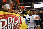 ATLANTA, GA - DECEMBER 04:  Quarterback Cam Newton #2 of the Auburn Tigers celebrates after their 56-17 win over the South Carolina Gamecocks during the 2010 SEC Championship at Georgia Dome on December 4, 2010 in Atlanta, Georgia.  (Photo by Kevin C. Cox/Getty Images)