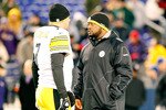 BALTIMORE, MD - DECEMBER 05:  Quarterback Ben Roethlisberger #7 of the Pittsburgh Steelers talks with head coach Mike Tomlin before the game against the Baltimore Ravens at M&T Bank Stadium on December 5, 2010 in Baltimore, Maryland.  (Photo by Geoff Burke/Getty Images)