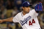 LOS ANGELES, CA - AUGUST 04:  Starting pitcher Vicente Padilla #44 of the Los Angeles Dodgers pitches against the San Diego Padres at Dodger Stadium on August 4, 2010 in Los Angeles, California. The Dodgers defeated the Padres 9-0.  (Photo by Jeff Gross/Getty Images)