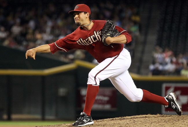 PHOENIX - AUGUST 04:  Relief pitcher D.J. Carrasco #77 of the Arizona Diamondbacks pitches against the Washington Nationals during the Major League Baseball game at Chase Field on August 4, 2010 in Phoenix, Arizona.  (Photo by Christian Petersen/Getty Images)