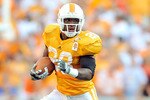 KNOXVILLE, TN - SEPTEMBER 18: Tauren Poole #28 of the Tennessee Volunteers breaks away from Janoris Jenkins #1 of the Florida Gators at Neyland Stadium on September 18, 2010 in Knoxville, Tennessee. Florida won 31-17.  (Photo by Grant Halverson/Getty Images)