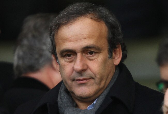 GLASGOW, SCOTLAND - OCTOBER 24:  UEFA president Michel Platini and Celtic chairman John Reid during the Clydesdale Bank Premier League match between Celtic and Rangers at Celtic Park on October 24, 2010 in Glasgow, Scotland.  (Photo by Clive Brunskill/Getty Images)