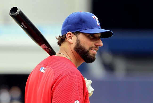 NEW YORK - OCTOBER 20:  Jeff Francoeur #21 of the Texas Rangers looks on during batting practice against the New York Yankees  in Game Five of the ALCS during the 2010 MLB Playoffs at Yankee Stadium on October 20, 2010 in the Bronx borough of New York City.  (Photo by Jim McIsaac/Getty Images)