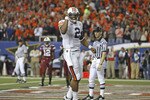 ATLANTA - DECEMBER 04:  Quarterback Cam Newton #2 of the Auburn Tigers celebrates after a touchdown during the 2010 SEC Championship against the South Carolina Gamecocks at Georgia Dome on December 4, 2010 in Atlanta, Georgia.  (Photo by Mike Zarrilli/Getty Images)
