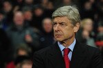 LONDON, ENGLAND - DECEMBER 08:  Arsene Wenger manager of Arsenal looks on prior to the UEFA Champions League Group H match between Arsenal and FK Partizan Belgrade at the Emirates Stadium on December 8, 2010 in London, England.  (Photo by Shaun Botterill/Getty Images)