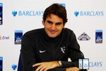 LONDON, ENGLAND - NOVEMBER 28: Roger Federer of Switzerland speaks at a press conference after winning his men's final match against Rafael Nadal of Spain during the ATP World Tour Finals at O2 Arena on November 28, 2010 in London, England.  (Photo by Clive Brunskill/Getty Images)
