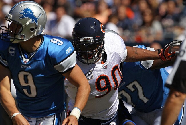 CHICAGO - SEPTEMBER 12: Julius Peppers #90 of the Chicago Bears pressures Matthew Stafford #9 of the Detroit Lions during the NFL season opening game at Soldier Field on September 12, 2010 in Chicago, Illinois. The Bears defeated the Lions 19-14. (Photo by Jonathan Daniel/Getty Images)