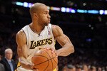 LOS ANGELES, CA - NOVEMBER 07:  Derek Fisher #2 of the Los Angeles Lakers grabs a rebound against the Portland Trail Blazers at the Staples Center on November 7, 2010 in Los Angeles, California.  NOTE TO USER: User expressly acknowledges and agrees that, by downloading and/or using this photograph, User is consenting to the terms and conditions of the Getty Images License Agreement.  (Photo by Harry How/Getty Images)