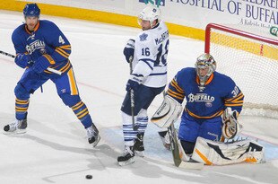 BUFFALO, NY - NOVEMBER 26: Steve Montador #4 and Ryan Miller #30 of the Buffalo Sabres defend against Clarke MacArthur #16 of the Toronto Maple Leafs at HSBC Arena  on November 26, 2010 in Buffalo, New York. Buffalo won 3-1.  (Photo by Rick Stewart/Getty Images)