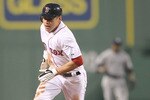 BOSTON - APRIL 06:  Jacoby Ellsbury #2 of the Boston Red Sox runs on an errant throw against the New York Yankees at Fenway Park on April 6, 2010 in Boston, Massachusetts. (Photo by Jim Rogash/Getty Images)