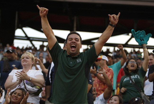 HONOLULU - SEPTEMBER 02: Fans cheer during first half action at Aloha Stadium September 2, 2010 in Honolulu, Hawaii. (Photo by Kent Nishimura/Getty Images)