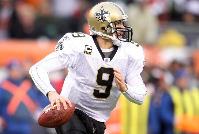 CINCINNATI, OH - DECEMBER 05:  Dree Brees #9 of the New Orleans Saints looks to throw a pass during the NFL game against the Cincinnati Bengals at Paul Brown Stadium on December 5, 2010 in Cincinnati, Ohio.  The Saints won 34-30.  (Photo by Andy Lyons/Getty Images)