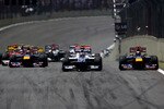 SAO PAULO, BRAZIL - NOVEMBER 07:  Sebastian Vettel of Germany and Red Bull Racing and Nico Huelkenberg of Germany and Williams compete after the start during the Brazilian Formula One Grand Prix at the Interlagos Circuit on November 7, 2010 in Sao Paulo, Brazil.  (Photo by Vladimir Rys/Getty Images)