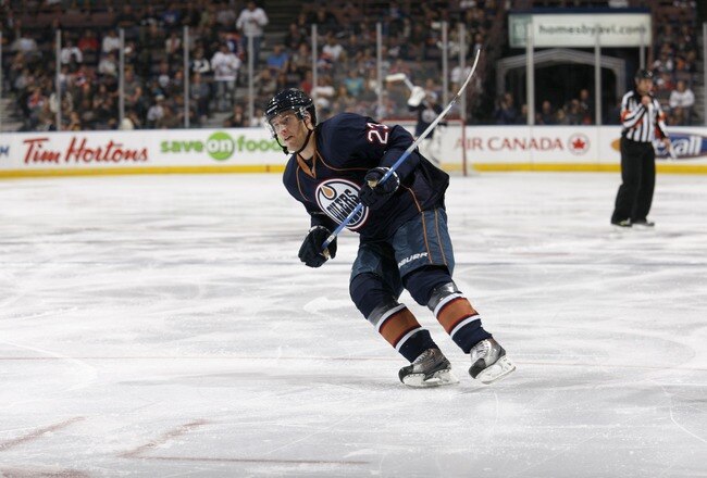 EDMONTON, CANADA - SEPTEMBER 26: Linus Omark #23 of the Edmonton Oilers skates against the Vancouver Canucks on September 26, 2010 at Rexall Place in Edmonton, Alberta, Canada. (Photo by Dale MacMillan/Getty Images)