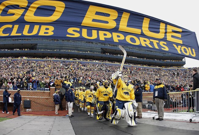 ANN ARBOR, MI - DECEMBER 11:  Shawn Hunwick #31 of the Michigan Wolverines leads his team to the ice prior to playing Michigan State at Michigan Stadium on December 11, 2010 in Ann Arbor, Michigan.  (Photo by Gregory Shamus/Getty Images)