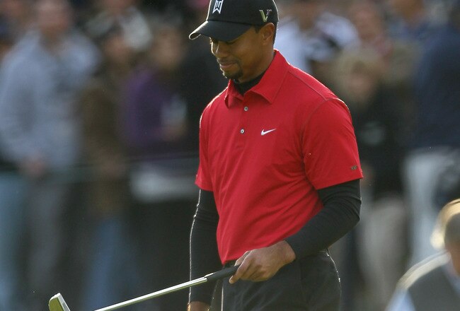 THOUSAND OAKS, CA - DECEMBER 05:  Tiger Woods reacts as his birdie putt attempt misses on the first playoff hole during the final round of the Chevron World Challenge at Sherwood Country Club on December 5, 2010 in Thousand Oaks, California. Graeme McDowell of Northern Ireland had birdied the hole and won the tournament.  (Photo by Stephen Dunn/Getty Images)