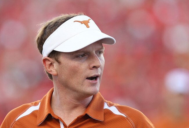 LUBBOCK, TX - SEPTEMBER 18:  Assistant head coach Major Applewhite of the Texas Longhorns at Jones AT&T Stadium on September 18, 2010 in Lubbock, Texas.  (Photo by Ronald Martinez/Getty Images)