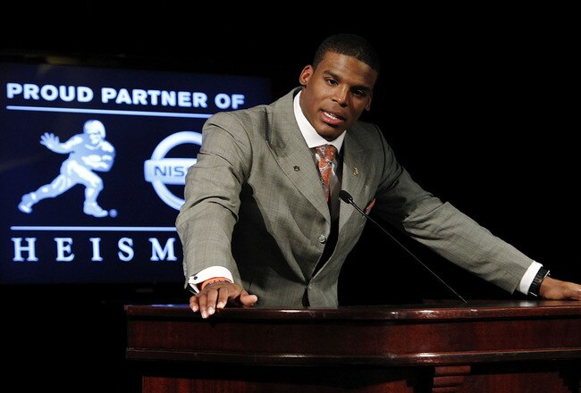 NEW YORK - DECEMBER 11:  Cam Newton, quarterback of the Auburn University Tigers, speaks after being awarded the 2010 Heisman Memorial Trophy Award on December 11, 2010 in New York City.  (Photo by Jeff Zelevansky/Getty Images)