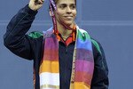 DELHI, INDIA - OCTOBER 14:  Saina Nehwal of India celebrates winning a gold medal in the women's singles badminton at Vijay Chowk during day eleven of the Delhi 2010 Commonwealth Games on October 14, 2010 in Delhi, India.  (Photo by Ian Walton/Getty Images)