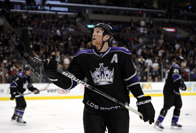 LOS ANGELES, CA - DECEMBER 11:  Matt Greene #2 of the Los Angeles Kings reacts to a 3-2 overtime loss to the Minnesota Wild at the Staples Center on December 11, 2010 in Los Angeles, California.  (Photo by Harry How/Getty Images)
