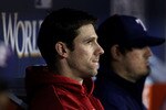 ARLINGTON, TX - NOVEMBER 01:  Losing pitcher Cliff Lee #33 of the Texas Rangers looks on from the dugout against the San Francisco Giants in Game Five of the 2010 MLB World Series at Rangers Ballpark in Arlington on November 1, 2010 in Arlington, Texas.  (Photo by Ronald Martinez/Getty Images)