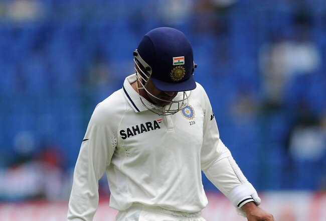 BANGALORE, INDIA - OCTOBER 13:  Virender Sehwag of India walks back after being dismissed by Ben Hilfenhaus during day five of the Second Test match between India and Australia at M.Chinnaswamy Stadium on October 13, 2010 in Bangalore, India.  (Photo by Pal Pillai/Getty Images)