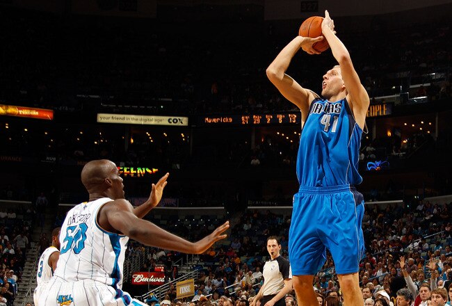 NEW ORLEANS - NOVEMBER 17:  Dirk Nowitzki #41 of the Dallas Mavericks shoots the ball over Emeka Okafor #50 of the New Orleans Hornets at the New Orleans Arena on November 17, 2010 in New Orleans, Louisiana.  The Hornets defeated the Mavericks 99-97.  NOTE TO USER: User expressly acknowledges and agrees that, by downloading and/or using this photograph, User is consenting to the terms and conditions of the Getty Images License Agreement.  (Photo by Chris Graythen/Getty Images)