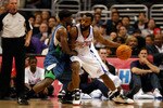 LOS ANGELES, CA - NOVEMBER 02:  Baron Davis #1 of the Los Angeles Clippers is defended by Jonny Flynn #10 of the Minnesota Timberwolves during the first half at Staples Center on November 2, 2009 in Los Angeles, California. NOTE TO USER: User expressly acknowledges and agrees that, by downloading and/or using this Photograph, user is consenting to the terms and conditions of the Getty Images License Agreement.  (Photo by Jeff Gross/Getty Images)
