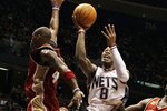 EAST RUTHERFORD, NJ - MARCH 03:  Terrence Williams #8 of the New Jersey Nets goes to the hoop against the Cleveland Cavaliers at the Izod Center on March 3, 2010 in East Rutherford, New Jersey.NOTE TO USER: User expressly acknowledges and agrees that, by downloading and or using this photograph, User is consenting to the terms and conditions of the Getty Images License Agreement.  (Photo by Jim McIsaac/Getty Images)